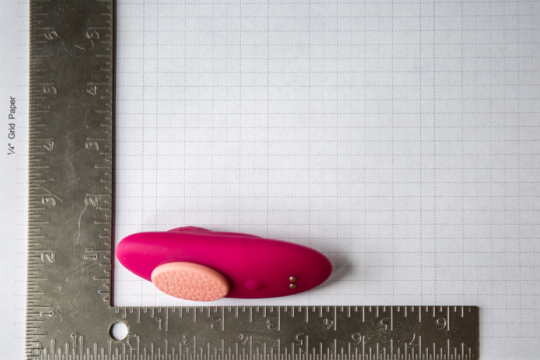 OhMiBod Foxy Dimensions Photo - Product Set On Graph Paper With Carpenter Square to See Size