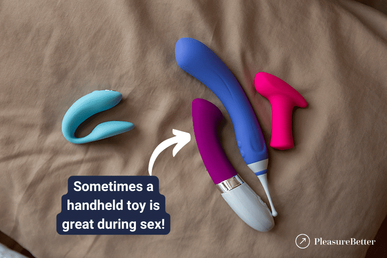 Three Handheld Toys Next to We-Vibe Chorus Showing Handhelds Are Great During Sex Too